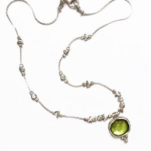 Silpada. Sterling silver with green glass in peridot color. Excellent condition